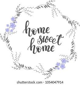 A hand drawn wreath of vector floral elements with a hand lettering quote inside. 'Home sweet home' poster
