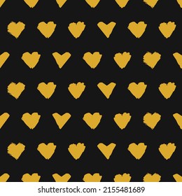 Hand drawn yellow hearts, simple texture with black background. Multiple painted heart icons vector illustration.
