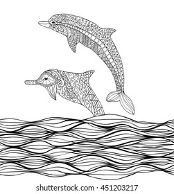 Hand drawn zentangle dolphins with scrolling sea wave for coloring book for adult
