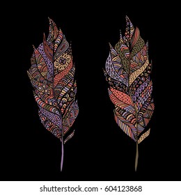 Hand drawn zentangle feather on solid background. Vintage set tribal feather. Colorful Design element.
