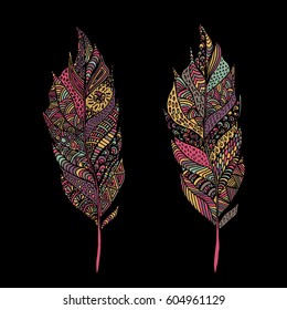 Hand drawn zentangle feather on solid background. Vintage set tribal feather. Colorful Design element.
