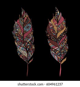 Hand drawn zentangle feather on solid background. Vintage set tribal feather. Colorful Design element.