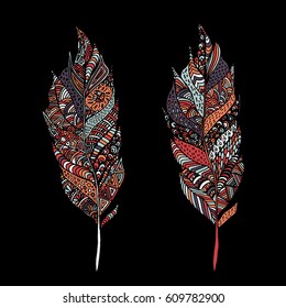 Hand drawn zentangle feather on solid background. Vintage set tribal feather. Colorful Design element.