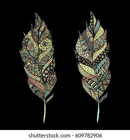 Hand drawn zentangle feather on solid background. Vintage set tribal feather. Colorful Design element.