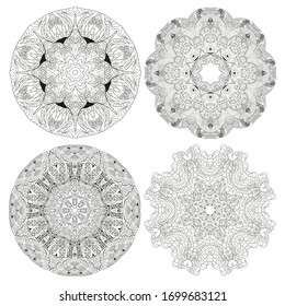 Conjunto zentangle dibujado a mano de 4 mandalas para la página de coloreado.