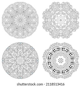 Hand drawn zentangle set of 4 mandalas for coloring page.