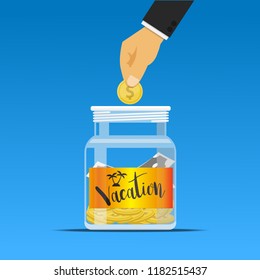 Hand dropping a coin into the vacation jar.