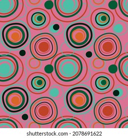 Hand drown vector pattern with circles elements, inspired by Sonia Delaunay. Seamless. Mint, orange, green color on the pink background. For prints, textiles, paper. Eps 10.