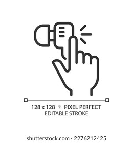 Hand with earphone pixel perfect linear icon. Finger tapping key on audio device. Wireless gadget for music listening. Thin line illustration. Contour symbol. Vector outline drawing. Editable stroke