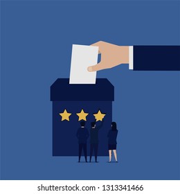 Hand entering paper to box for voting business team give three stars.