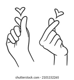 Hand with fingers in heart shape. Cute finger hearth gesture. Saranghae