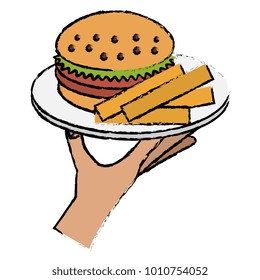 hand with french fries and burger