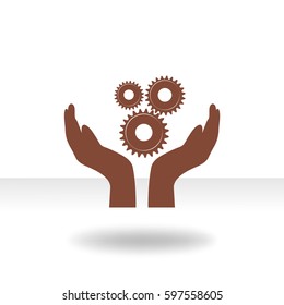 Hand and gear over beige background vector illustration
