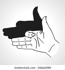 Hand gesture like dog face with shadow. Concept of make-believe danger. Outline vector illustration