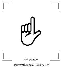 hand gesture with a raised index finger on a light background