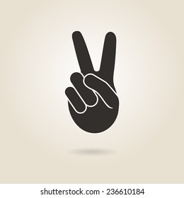 hand gesture victory symbol on a light background