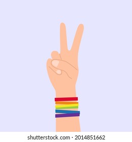 Hand gesturing peace with rainbow colored LGBTQ bracelets on blue background isolated vector illustration. LGBTQ community symbol, concept. Gay pride. LGBT, love movement. Pacific sign