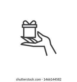 Hand with gift box present line icon. linear style sign for mobile concept and web design. Gift box on hand outline vector icon. Symbol, logo illustration. Vector graphics