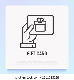 Hand with gift card. Certificate for purchase, discount, coupon. Thin line icon. Modern vector illustration of present for Christmas, Valentine day or birthday.