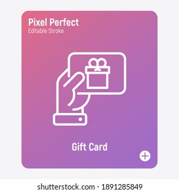 Hand with gift card, certificate for purchase, discount, coupon. Thin line icon. Pixel perfect, editable stroke. Modern vector illustration of present for Christmas, Valentine day or birthday.