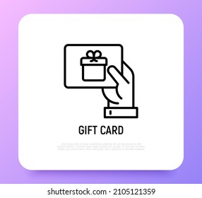 Hand with gift card. Certificate for purchase, discount, coupon. Thin line icon. Modern vector illustration of present for Christmas, Valentine day or birthday.