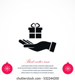 Hand and gifts icon, flat design best vector icon