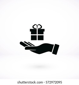Hand and gifts icon, flat design best vector icon