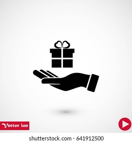 Hand and gifts icon, flat design best vector icon