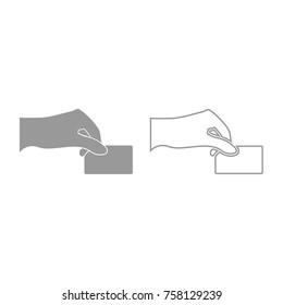 Hand give electronic card grey icon .