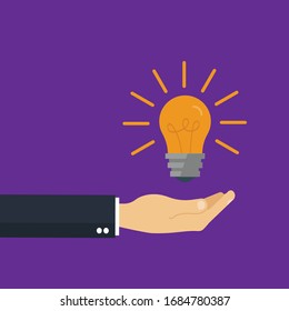Hand give idea. Conceptual vector illustration in flat style design. Hand holding electrical bulb.symbol of creative solutions.Isolated on background.