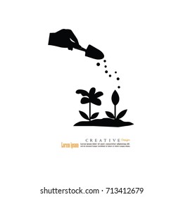 hand giving fertilizer to plant.vector illustration.