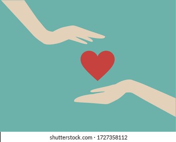 Hand giving a heart to another one’s hand. Concept about love, care, sharing, donation, human kindness.

