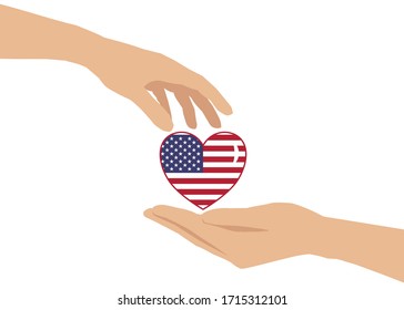 There’s a hand giving a heart to another one’s hand. The heart is contained USA flag pattern inside. Concept about love, care, sharing, donation, human kindness and etc.