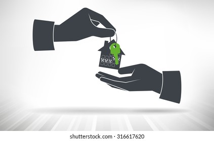 Hand giving house keys. House key with small house calendar key ring given from one hand to another. 