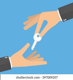 Hand giving key to another hand concept