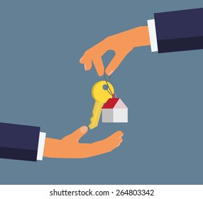 Hand giving key for house,successful investment concept