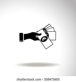 Hand giving money euro