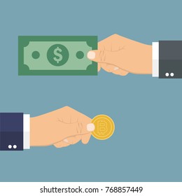 Hand giving money and receiving bitcoin