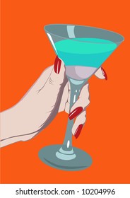 Hand with a glass of martini.
