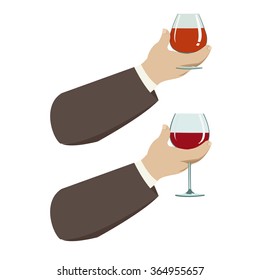 hand with glass of wine