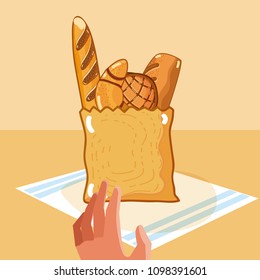 Hand grabbing delicious breads