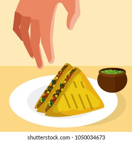 Hand grabbing tacos