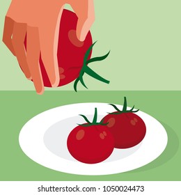 Hand grabbing tomato