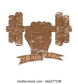 Hand grasping dumbbell. Grunge background, vintage t-shirt logo.