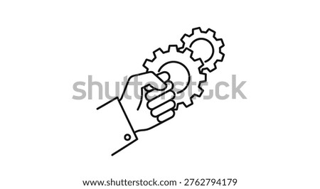 A hand grasping a gear system