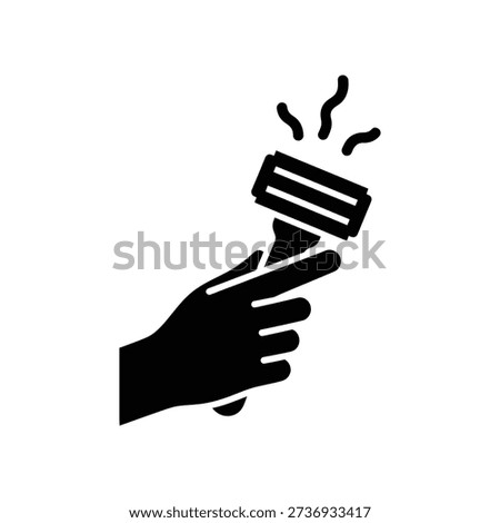 A hand grasping a hot flat iron, emitting heat waves, on a white background.