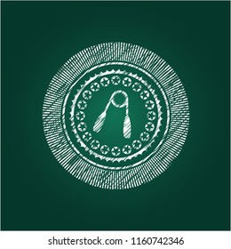 hand gripper icon drawn on blackboard