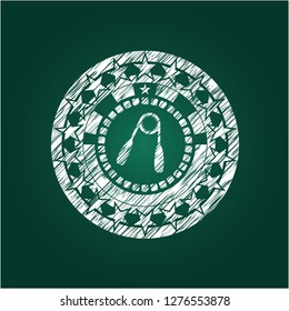 hand gripper icon drawn on blackboard