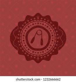 hand gripper icon inside badge with red background