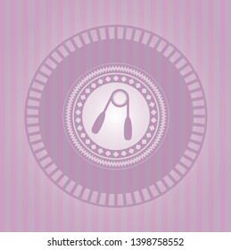 hand gripper icon inside badge with pink background